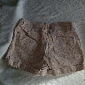 Floral print denim shorts with a vintage style, stretchy, front and back pockets